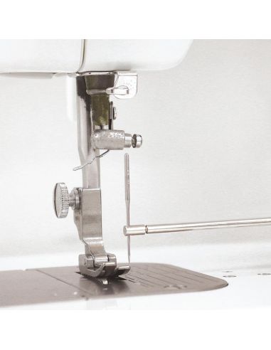 Outil de changement d'aiguille machine