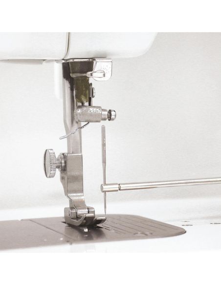 Outil de changement d'aiguille machine