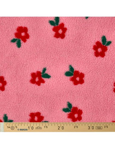 Tissu fourrure Teddy - Fleurs rouges fond rose bonbon