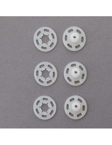 Boutons pression plastiques transparents 7 mm